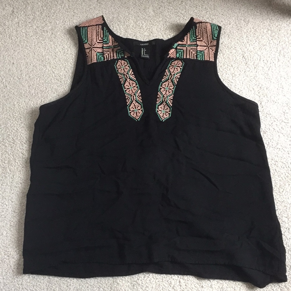 Black sleeveless top with embroidery